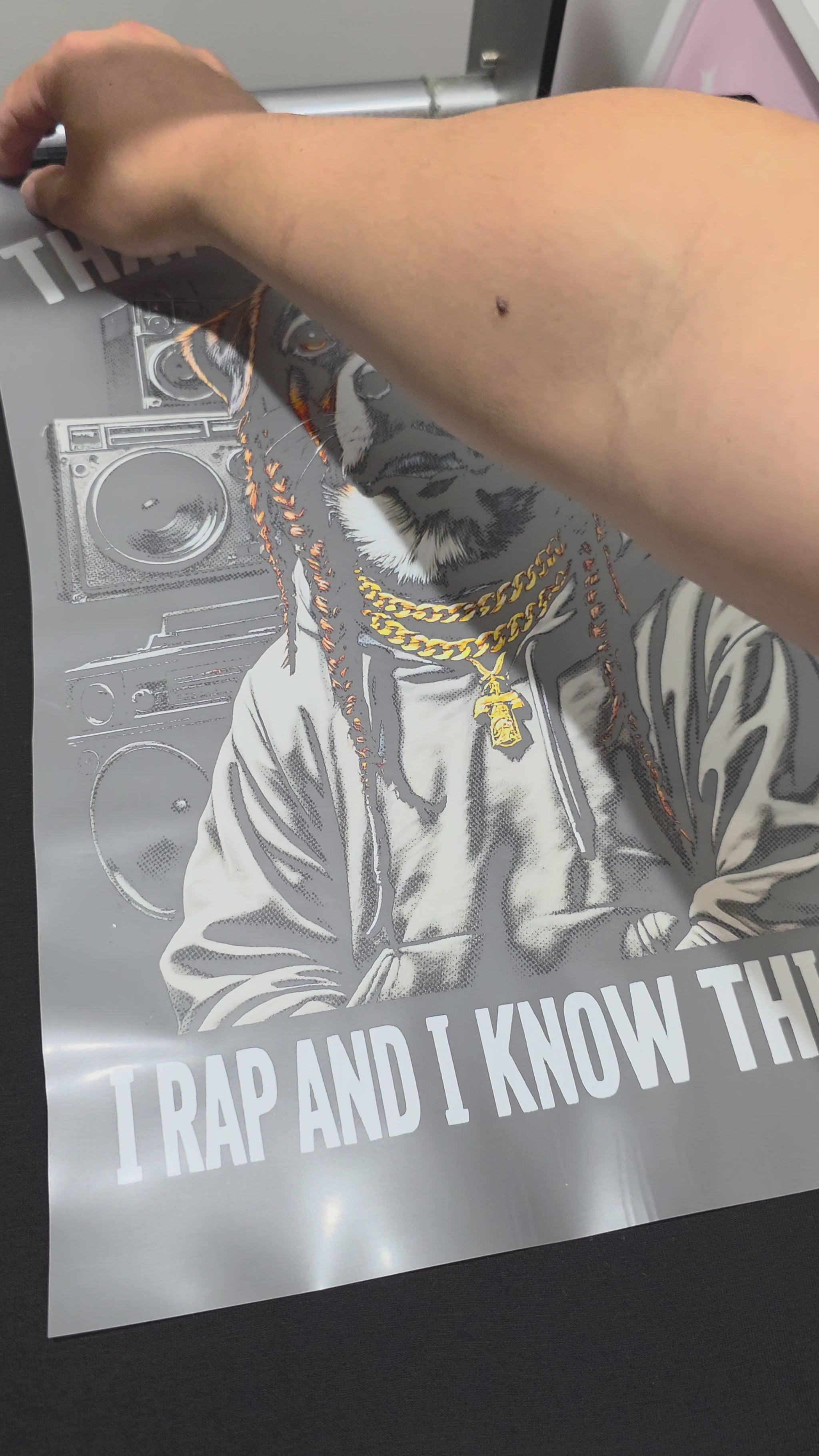 Close-up video showing a vibrant, premium-quality Vivid Pro DTF heat transfer on black fabric.